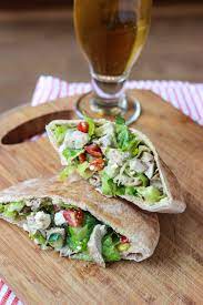 GREEK FLAT BREAD PITA-with chicken, lettuce, tomato, feta and tzatziki sauce or vegan: hum…
