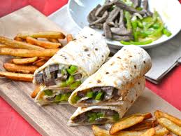 Steak and Cheese Wrap -Shaved steak, peppers, onions and Cheddar-Jack cheese…