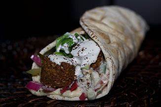 Madison House-Made Falafel, Roasted Garlic Hummus, Lettuce, Tomato, Red Onion and Cucumber…