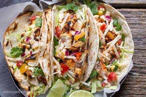 Fish Tacos -3 Grilled Mahi Tacos with Lettuce, Onions, Bell Peppers, Tomatoes, Cheddar, &#…